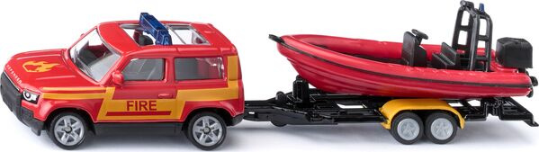 Land Rover Defender mit Boot