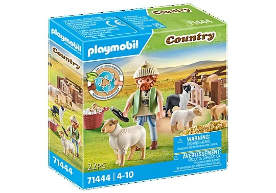 Country Junger Schäfer mit Schafen